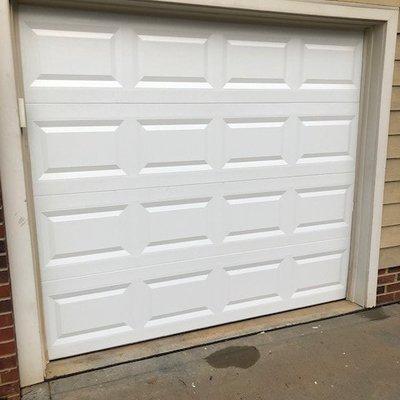 AFTER replacing damaged garage door