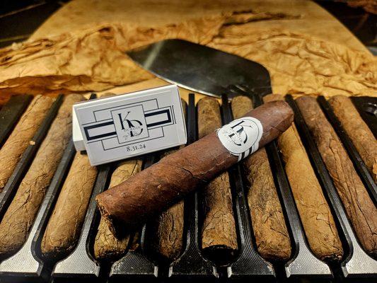 Create your own signature cigar with custom bands and matches.