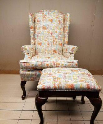 Combination wing back chair and a stool reupholstered by Han.