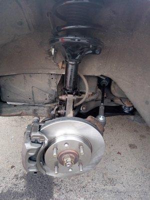 Front Rotor Strut Axle Caliper tie rod brake Pad replacement.