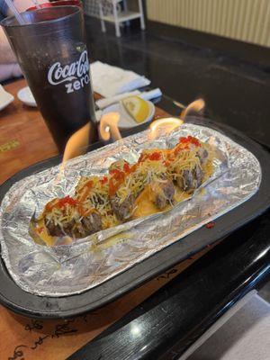 Texas Ranger Roll (yes! It's on fire!) so freaking good. The steak was wonderful on it!