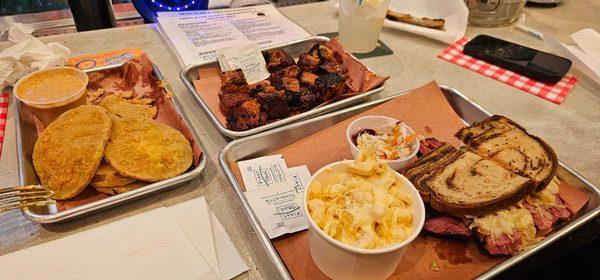 Ruben sandwich, green friend tomatoes and Mac and cheese