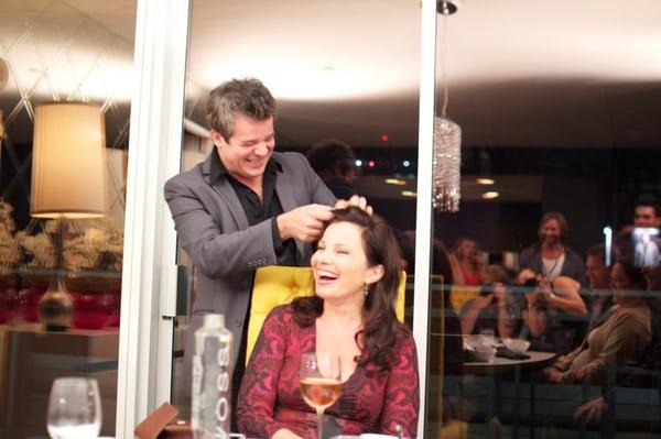 LOUIS FROM LOUIS DE CHIARRO , TOUCHING UP ACTRESS FRAN DRESHNER'S HAIR FOR A FUNDRAISER SHE ATTENDED.