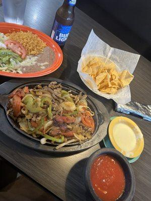 Beef fajitas, cheese dip, and salsa and chips. Big portion and it was excellent!