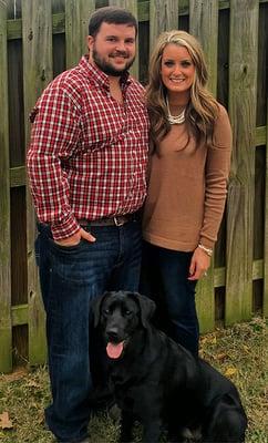 Dr. and Mrs. Reith, and their black lab, Remi!