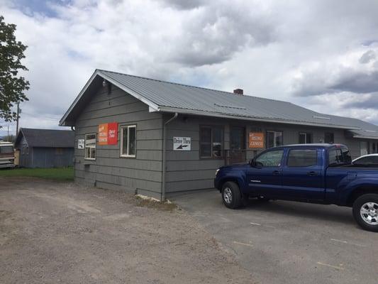 Convenient drive thru pick up. Soon to be paved