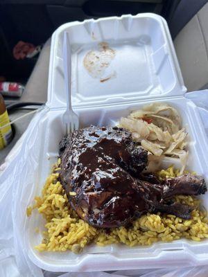 Jerk bbq chicken with rice and peas and cabbage