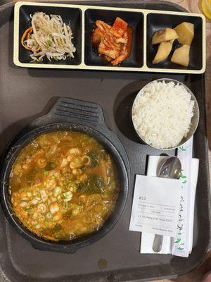 Hangover soup that tasted like soybean paste soup. Comes with a bowl of rice and 3 side dishes.