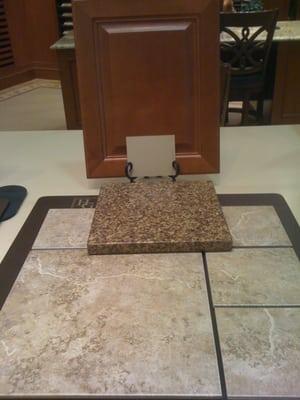 Cabinets, tile and granite countertop
