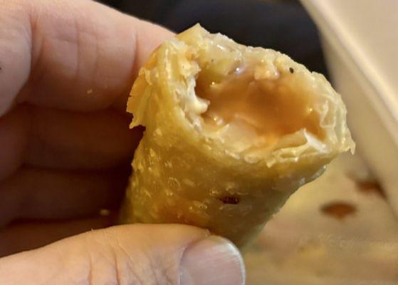 The egg roll is as small as I would have expected a spring roll to be. Not much inside.