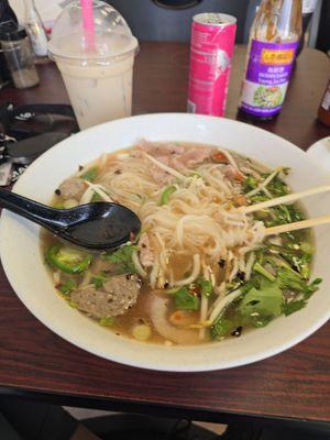 Steak and meatball pho and a brown sugar milk tea.