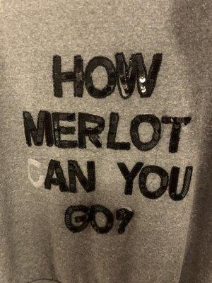 Sequin sweatshirt where they ruined lettering and gave back with missing pieces.