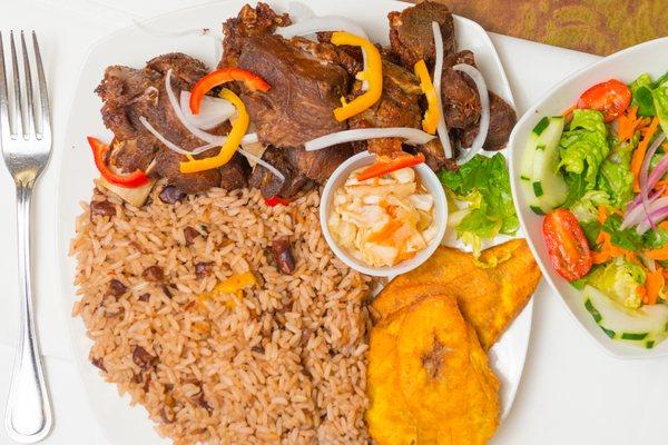 Fried Turkey with rice and beans and fried plantains