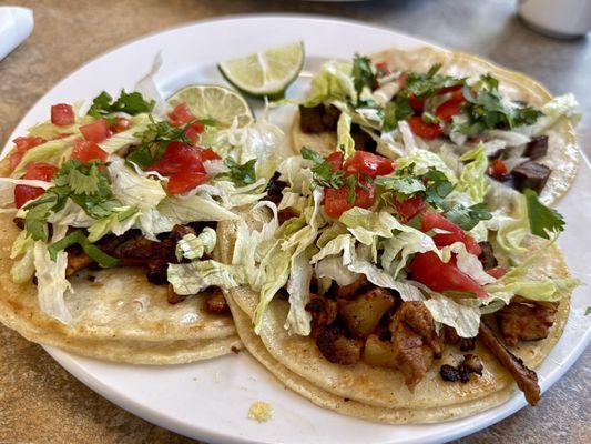 Steak and Al pastor tacos. Delicious.