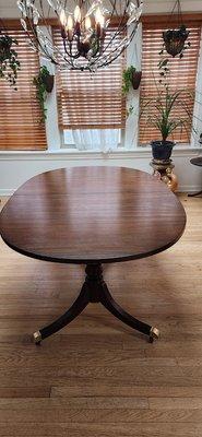 Dining room table, built in 1945, repaired & refinished by Alex Camacho.