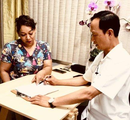 Medical consultation with Dr. Wang.