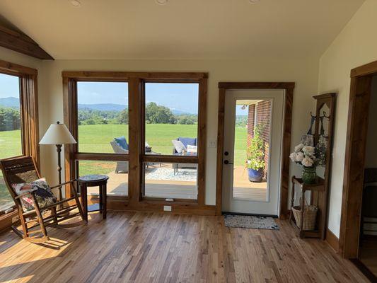 New sunroom addition with large windows for the mountain view.