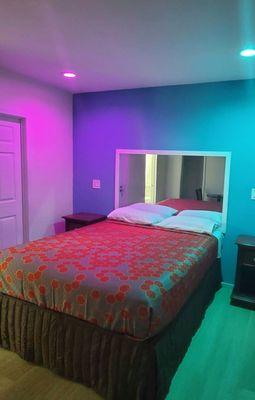 Clean room with cool lighting.