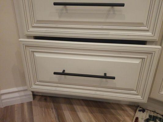 Two drawers and one hole! Bottom drawer false out when opened. Nice!!