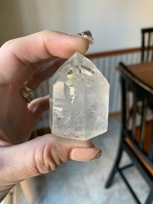 Beautiful Manifestation Quart Crystal. Has a point inside the main point. It's absolutely stunning.
