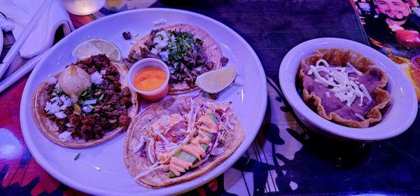 Amazing tacos! Steak, steak and chorizo, and shrimp