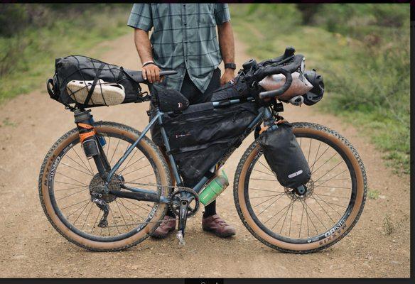We built this rig for this awesome human who has since ridden it the length of S. America, across N. America, down Europe and down Africa.