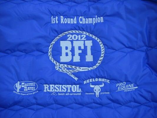 5 embroidered logos on horse blanket