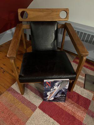 Odd chair they had at desk was a foot off the ground - height of a child's chair at a normal height desk. We moved it.