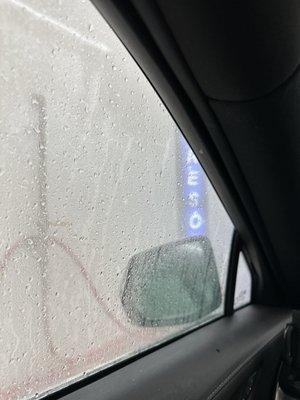 They spray your car down before you go into the car wash