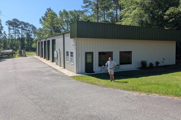 Alex in front of Longleaf Solutions