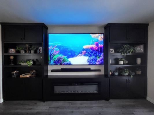 Custom built media wall. Rich truly made it custom to our uniquely shaped wall and house!