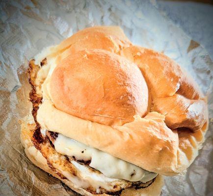 Sausage, egg and cheese, breakfast sandwich and a hard roll.