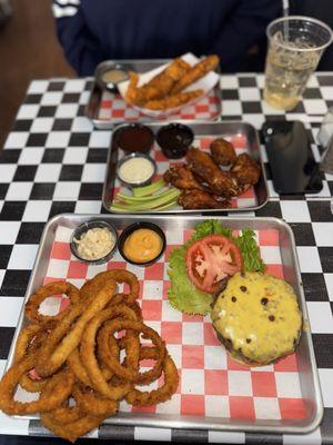 Cheeseburger, onion rings, wings, chicken tenders