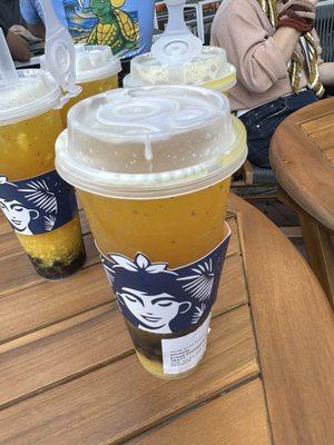 Pineapple mango tea with boba