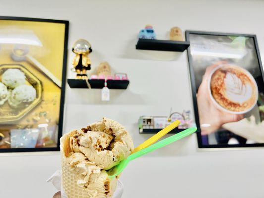 Double scoop of Biscoff ice cream in a vanilla waffle cone.