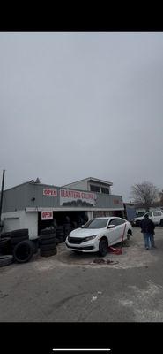 Car front of the shop