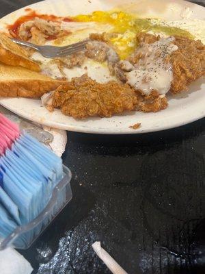 Vaqueros plate. I know forgot to take a pic before he dug in it lol