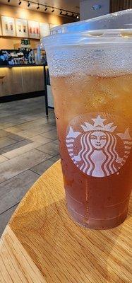 Black tea lemonade with peach juice.
