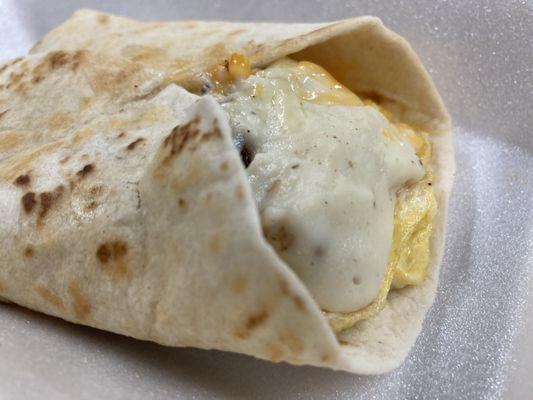 Large breakfast wrap with your choice of sausage or bacon. (also comes in regular size)
