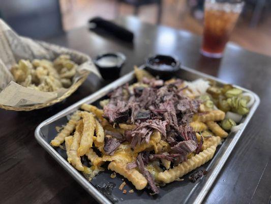 Popular menu item - loaded brisket fries! All BBQ slow smoked in house and so tender!