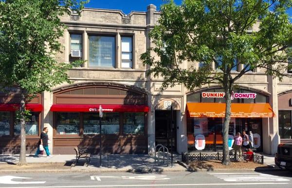 Our Beacon St entrance is in between CVS/pharmacy and Dunkin Donuts