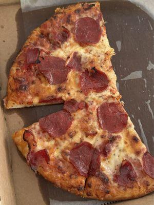 Small pepperoni and bacon pizza