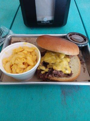 Brisket sandwich with mac and cheese.
