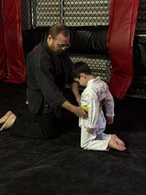 Getting his well deserved yellow belt!