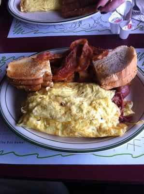 Italian omelette with homefries, scali toast and bacon. Boom!