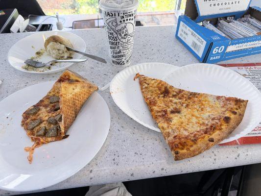 Two slice one with sliced meatballs and drink Lunch special