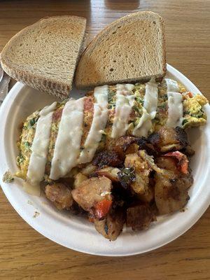 Tomato, swiss and spinach omelette.  Delicious and great presentation for a bagel shop. Eliu makes it great and with a smile!