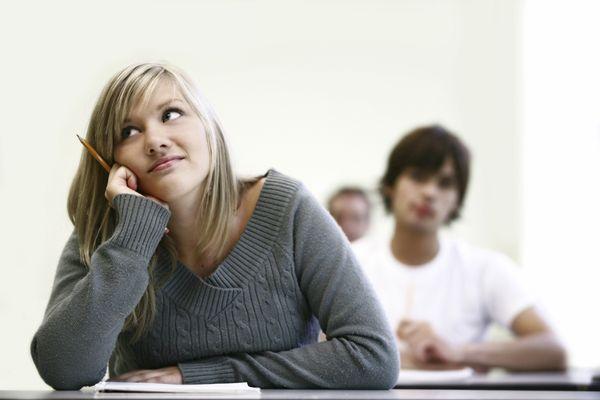 Students thinking about college applications.