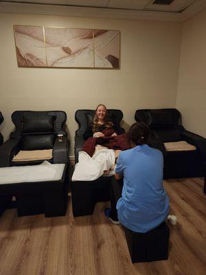 Getting a nice relaxing foot massage.