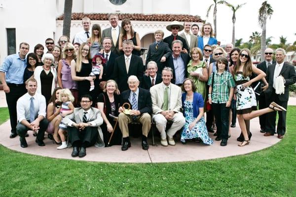 The Peek Brothers, sisters and spouses celebrating Pops' birthday on my mothers memorial bronze bench.